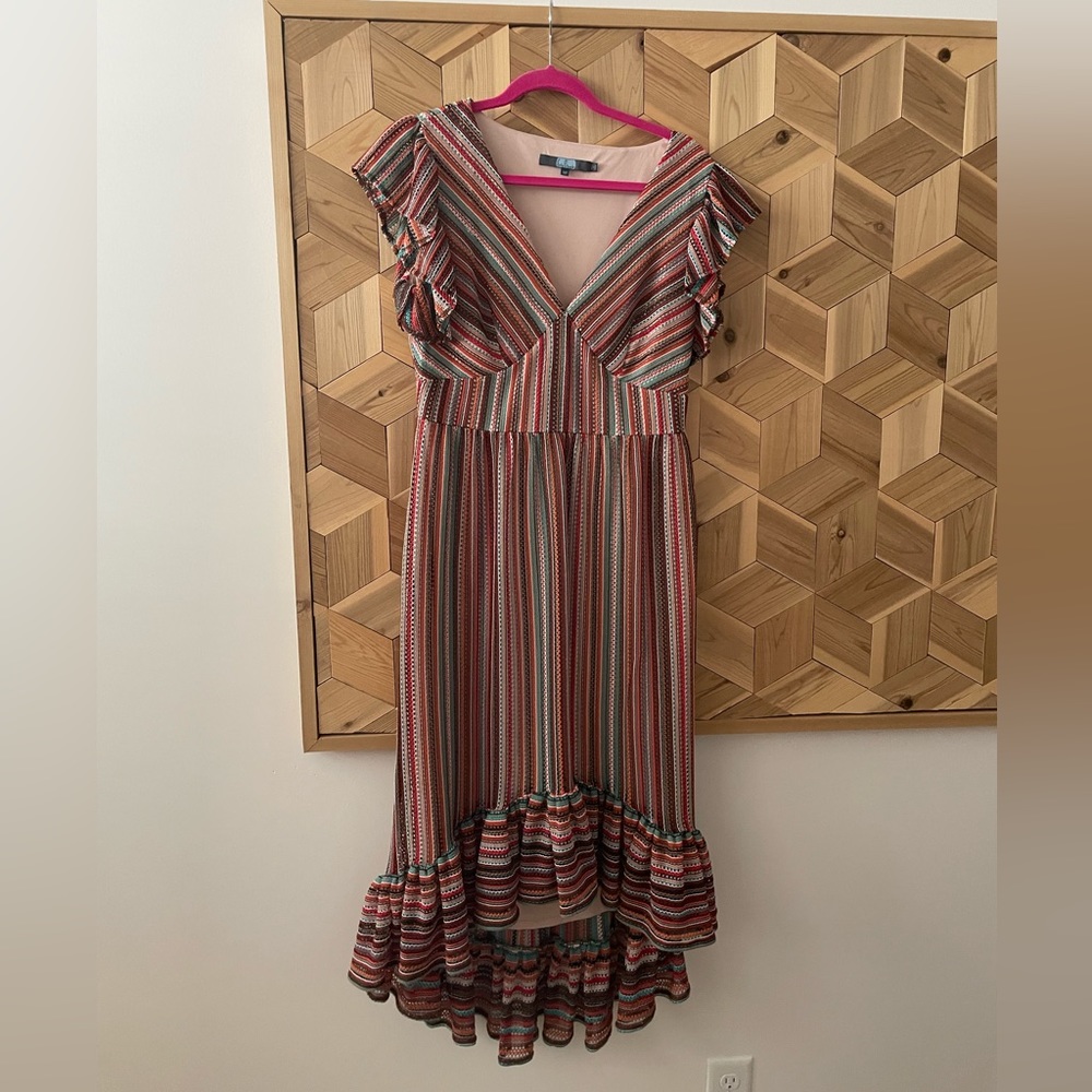 Eva Franco multi-colored dress with fluttered sleeves and hem